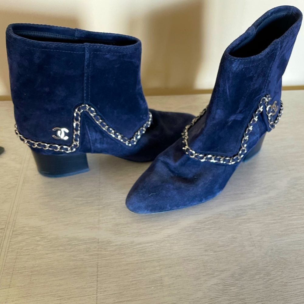 Suede CHANEL booties with chain detail